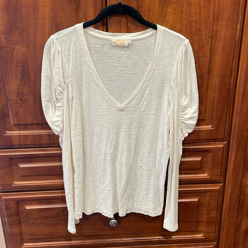 Nation tee- never worn! Size Large